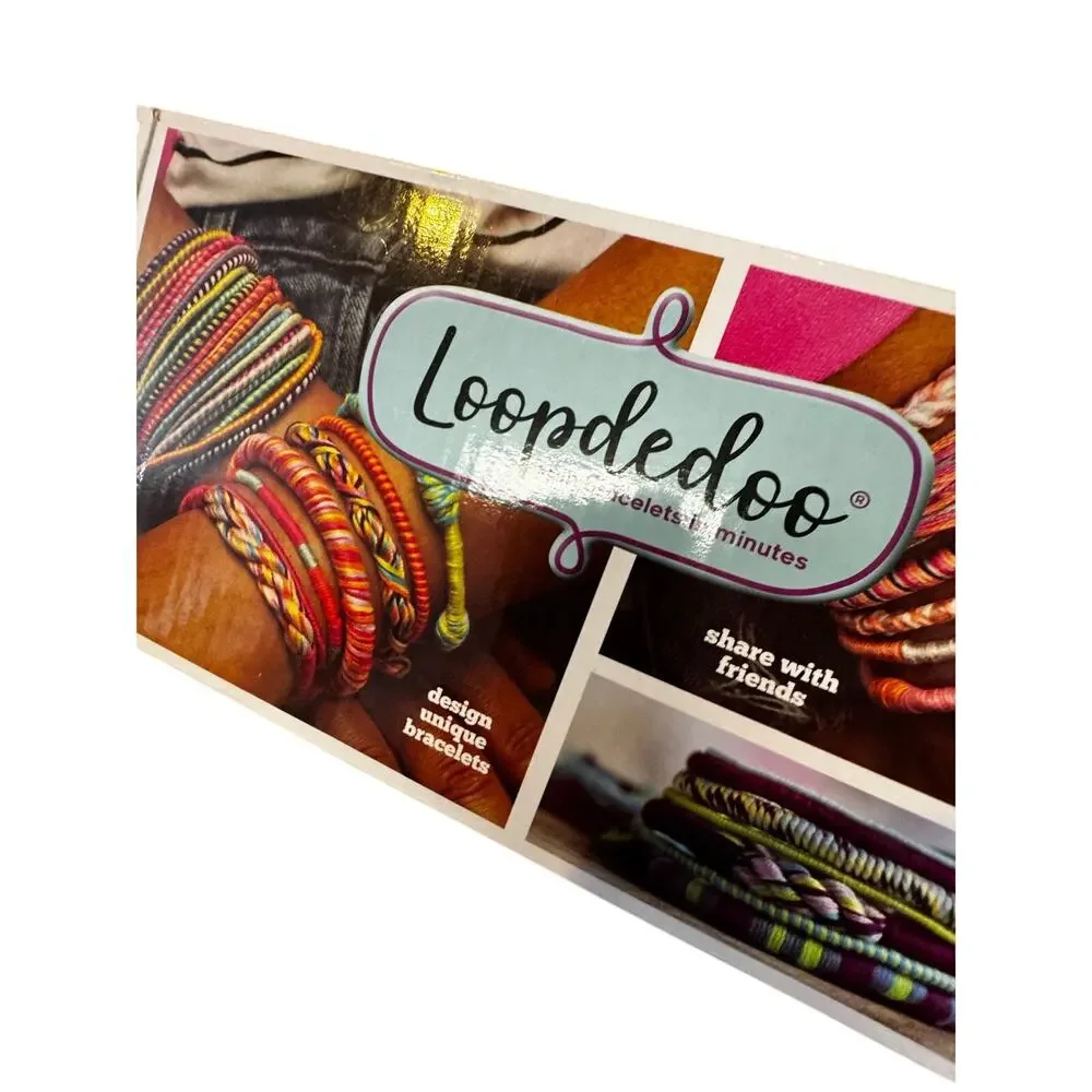 USED ONCE LOOPDEDOO SPINNING LOOM BRACELET MAKER KIT